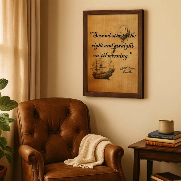 Framed canvas with a vintage ship and moon quote from Peter Pan by J.M. Barrie hanging above a leather reading chair in a cozy corner with warm light and a cream throw blanket.