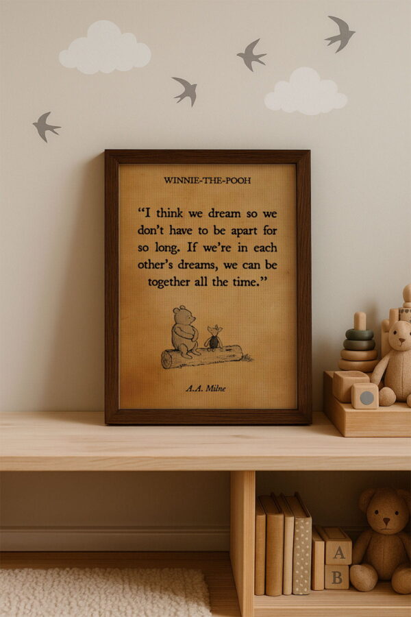 Framed canvas print with the quote “If we’re in each other’s dreams, we can be together all the time,” styled in a modern nursery with neutral tones, wooden toys, and decorative cloud and bird wall decals.