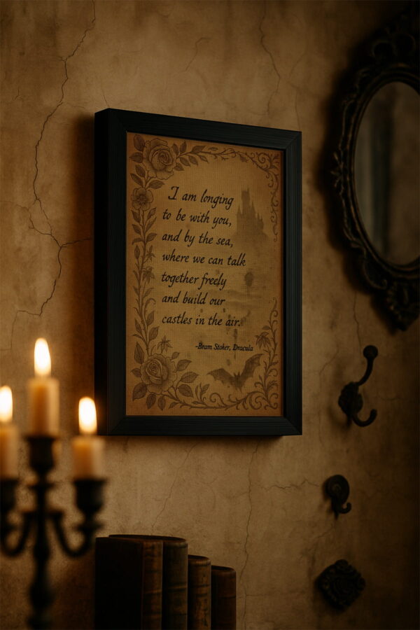 Vintage quote print from Dracula displayed in a Victorian hallway with ornate wall décor and books.