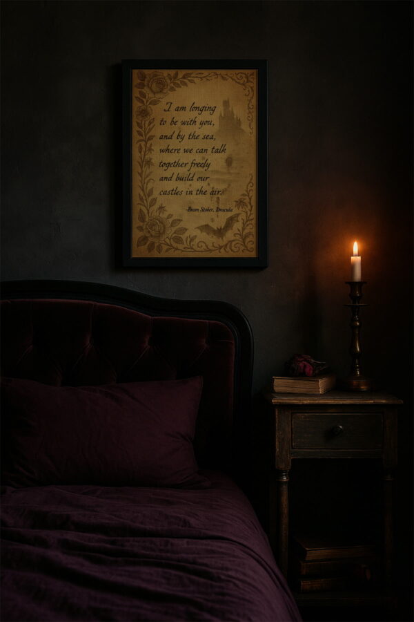Romantic gothic quote canvas from Dracula above a deep red bed in a dark bedroom with a lit candle.
