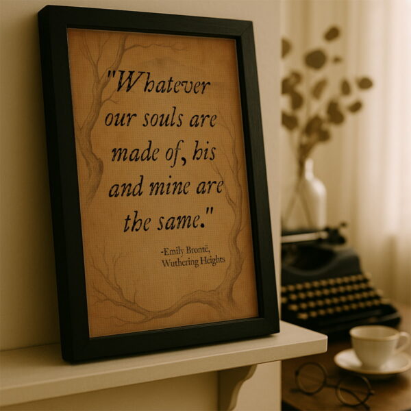 Black frame canvas leaning on a cream-colored shelf beside a typewriter and coffee cup in a softly lit writing nook.