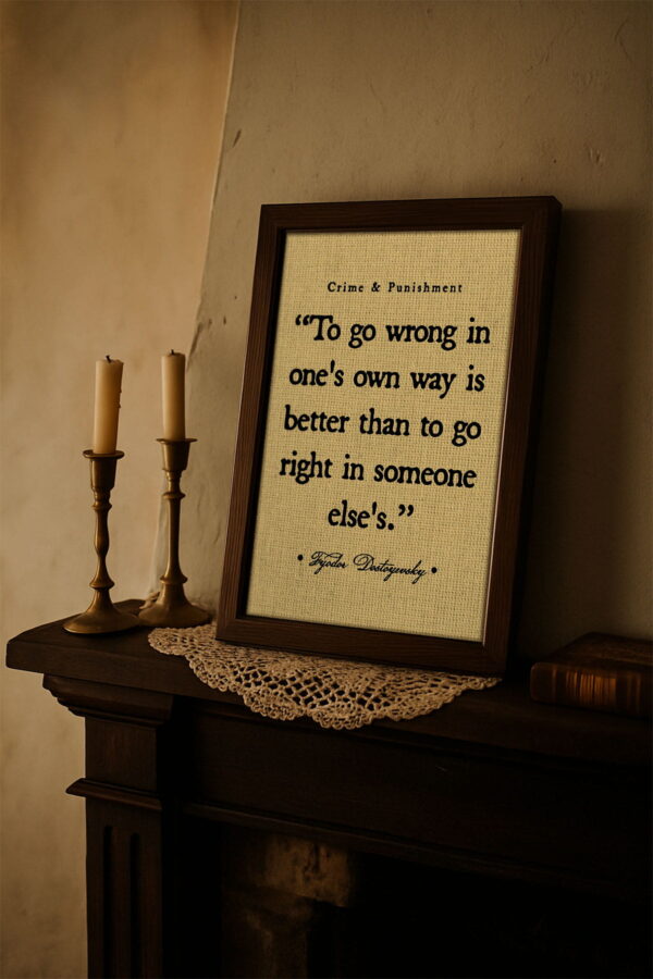 Framed Fyodor Dostoyevsky quote displayed on a vintage mantel alongside brass candlesticks and a lace doily, with warm, nostalgic lighting creating an old-world literary ambiance.